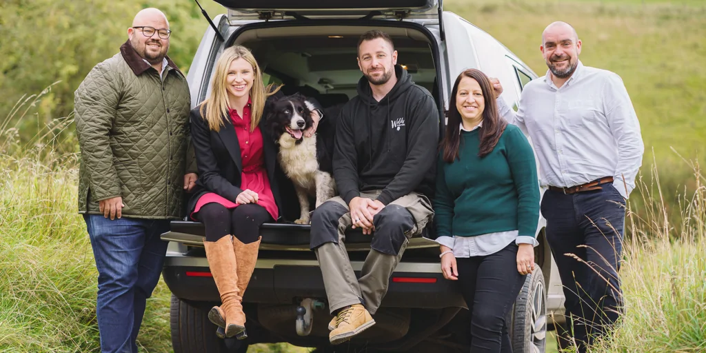 Wolds Furniture team in a vehicle in the countryside